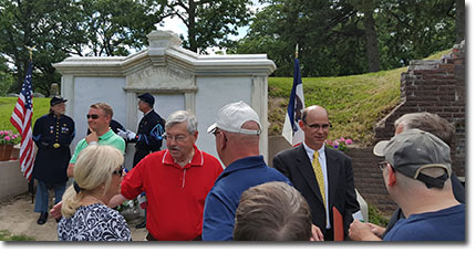 Iowa Governer Terry Branstad visits with attendees